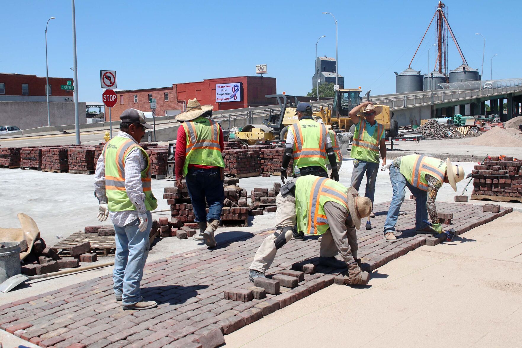 Paulsen begins relaying bricks on 6th street, signaling end to first phase of downtown project